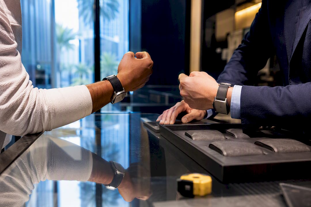 Shopper comparing watch options for different occasions