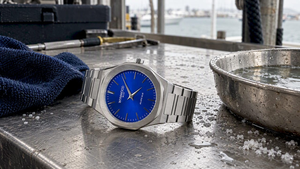 Atlantic Blue stainless steel watch on coastal workbench
