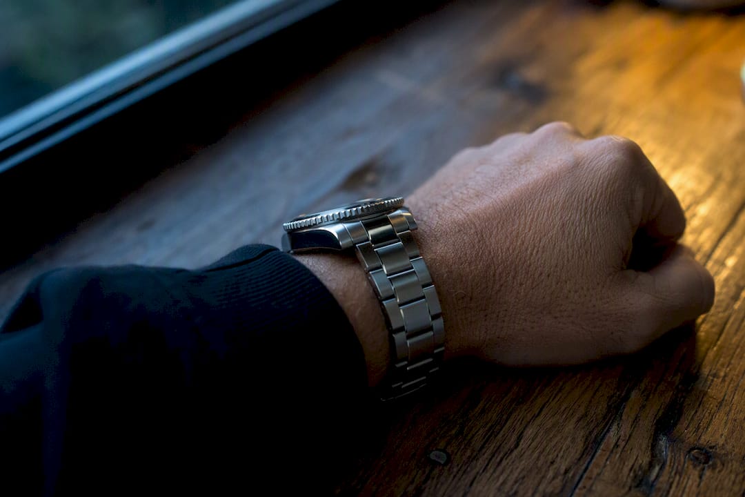 Partial close-up of stainless steel watch bracelet