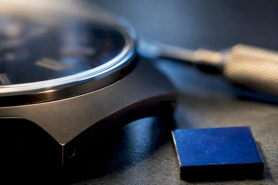 Sapphire crystal and coated watch case edge