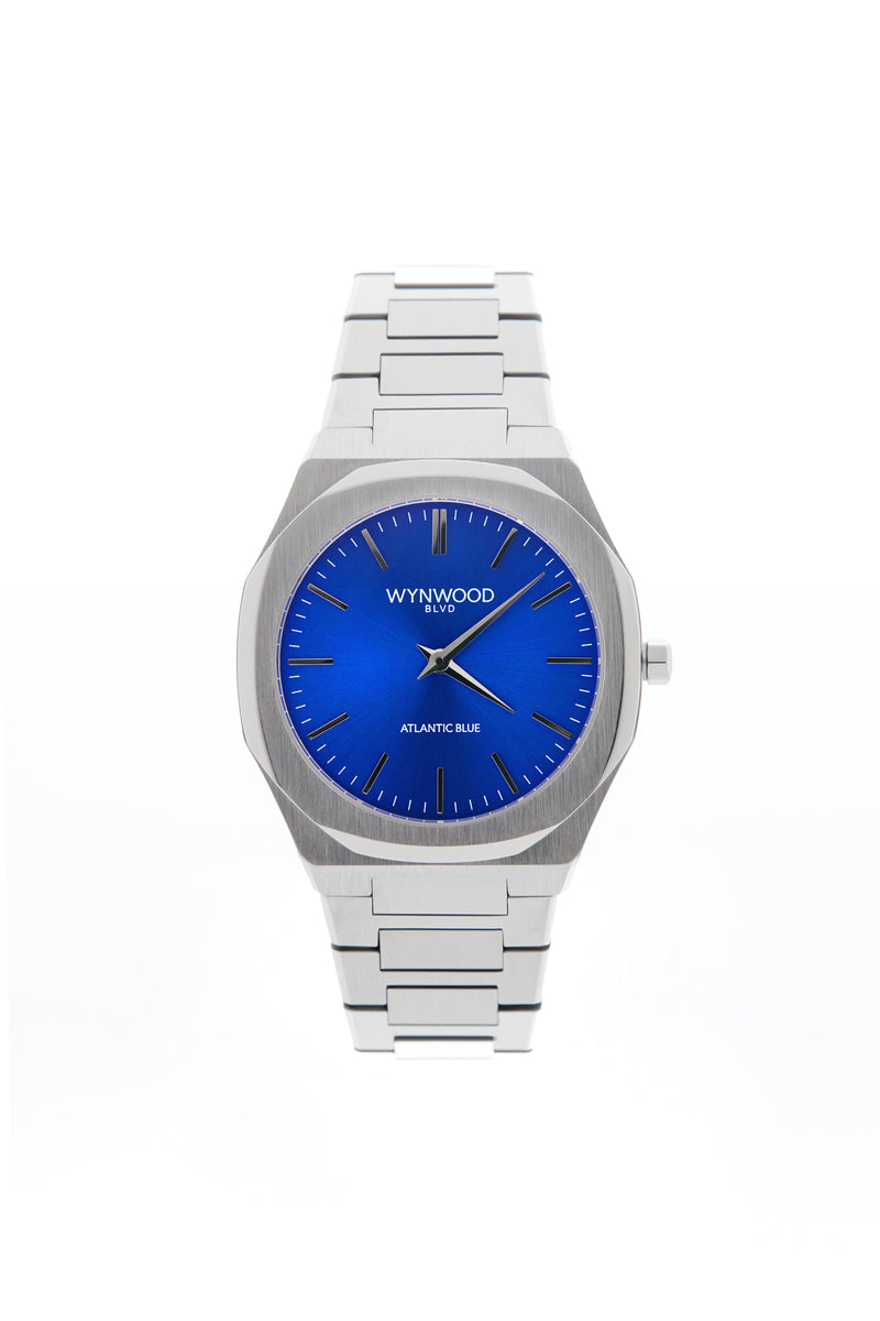 Front view of the WYNWOOD BLVD Atlantic Blue watch featuring a stainless steel bracelet and deep blue dial on a clean white background.