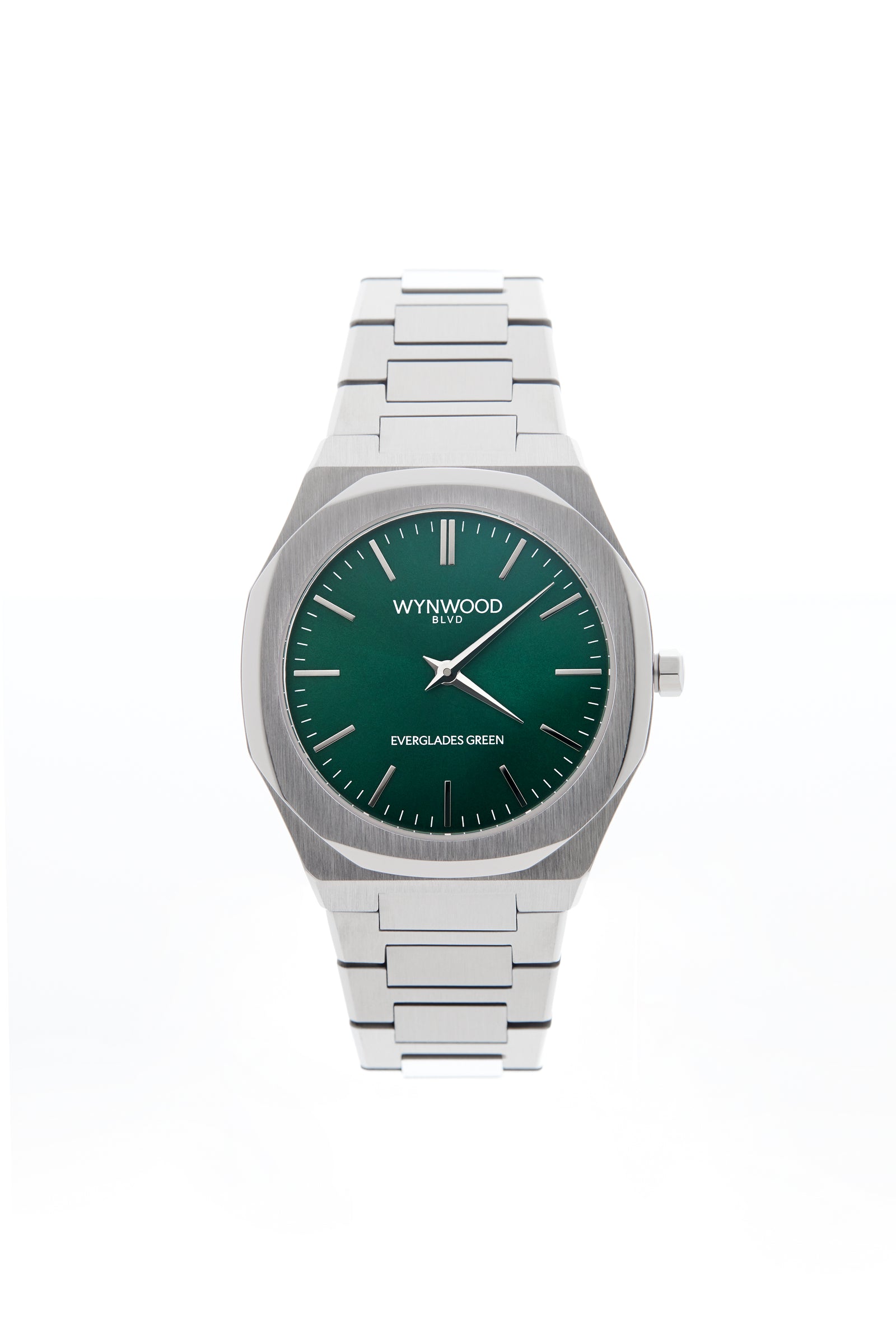 Front view of the WYNWOOD BLVD Everglades Green watch featuring a stainless steel bracelet and deep green dial on a clean white background.
