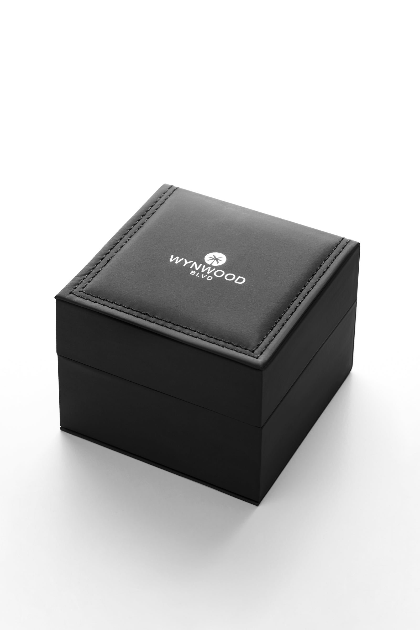 Premium WYNWOOD BLVD watch gift box shown closed on a clean white background.