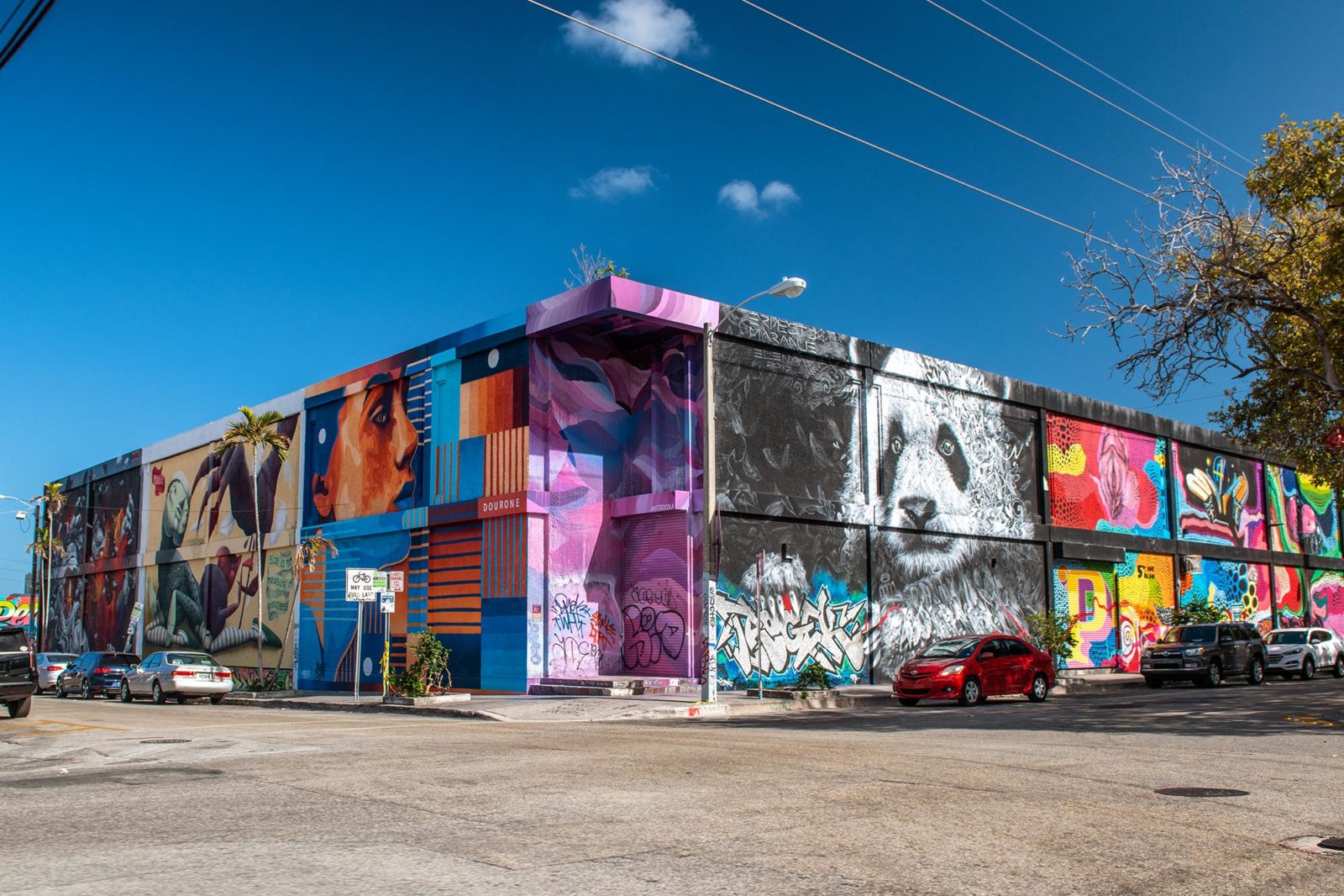 Colorful street art murals in Miami’s Wynwood Arts District, the creative neighborhood that inspired the WYNWOOD BLVD jewelry and watch collection.